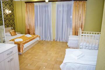 Фото номера Классический четырехместный номер Отель Rubin Hotel г. Горис 8