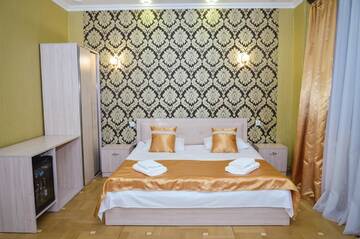 Фото номера Классический четырехместный номер Отель Rubin Hotel г. Горис 11
